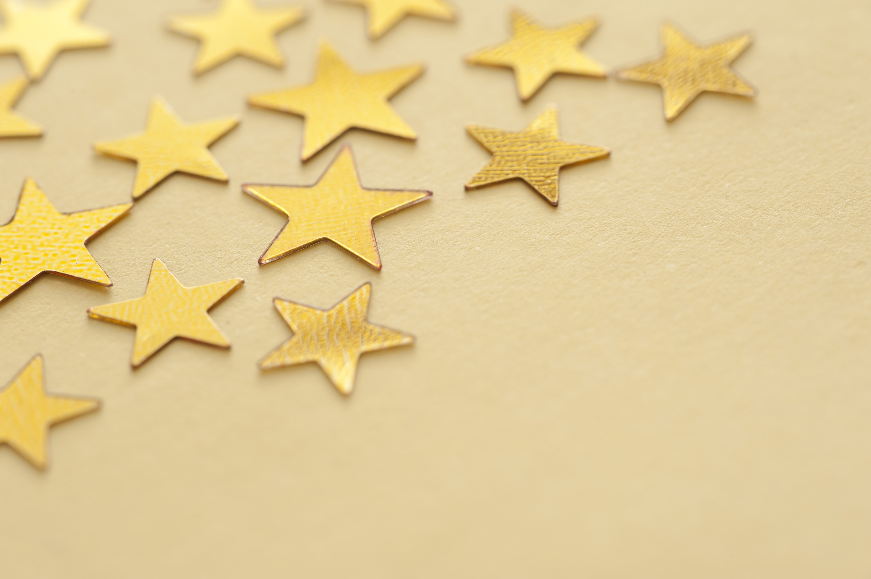 Gold star background with copyspace for your festive or Christmas