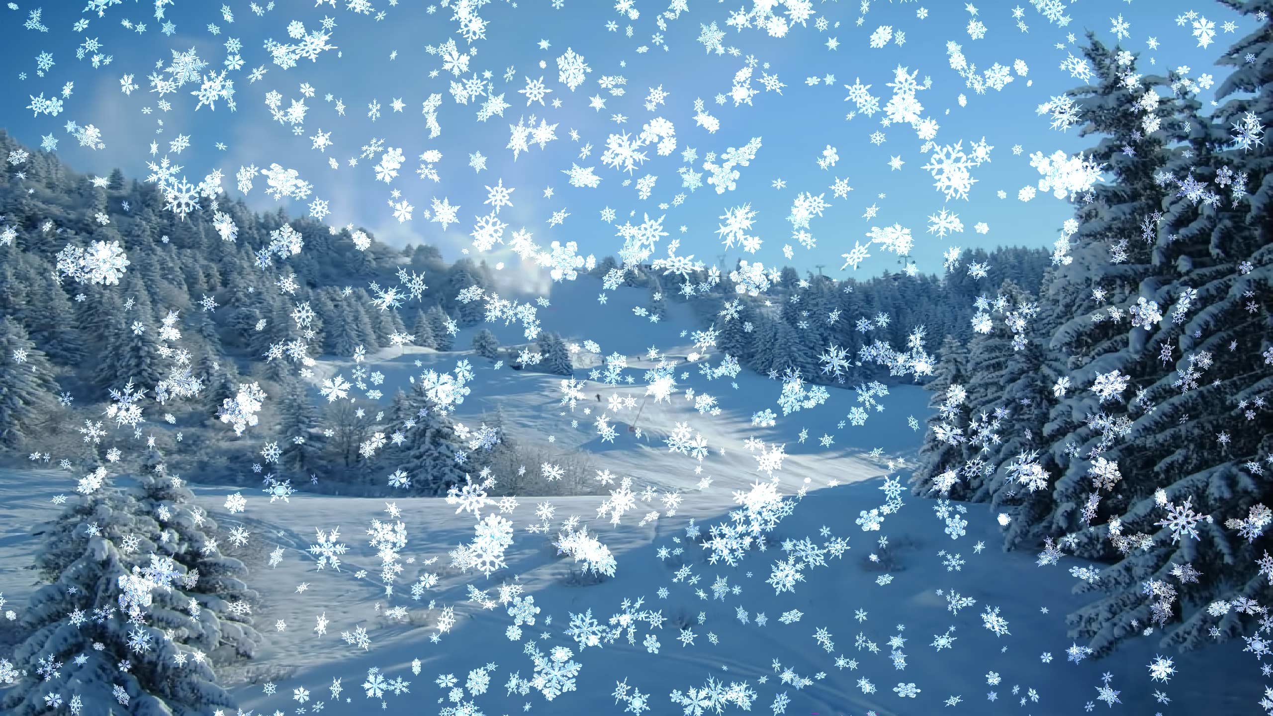 Snowflakes falling on a snowy mountain landscape