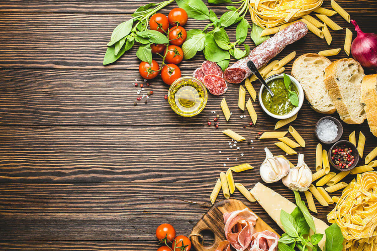 Taste The Freshness Of Food Ready To Serve On Table Wallpaper