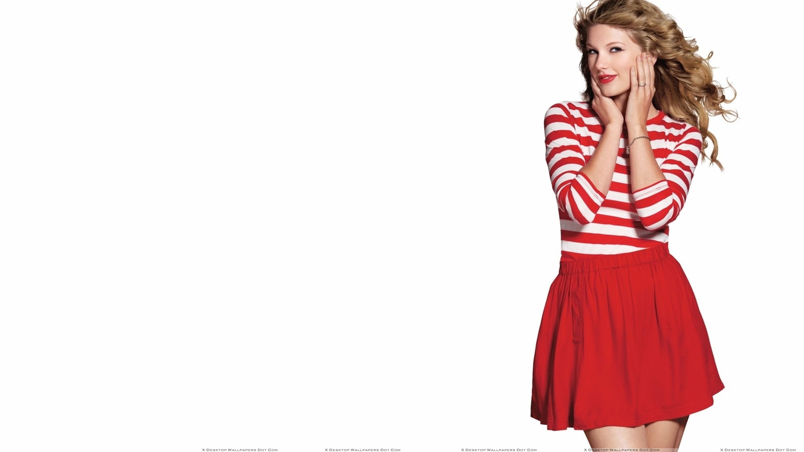 Taylor Swift In Red Stripe Dress Making A Cute Pose Wallpaper