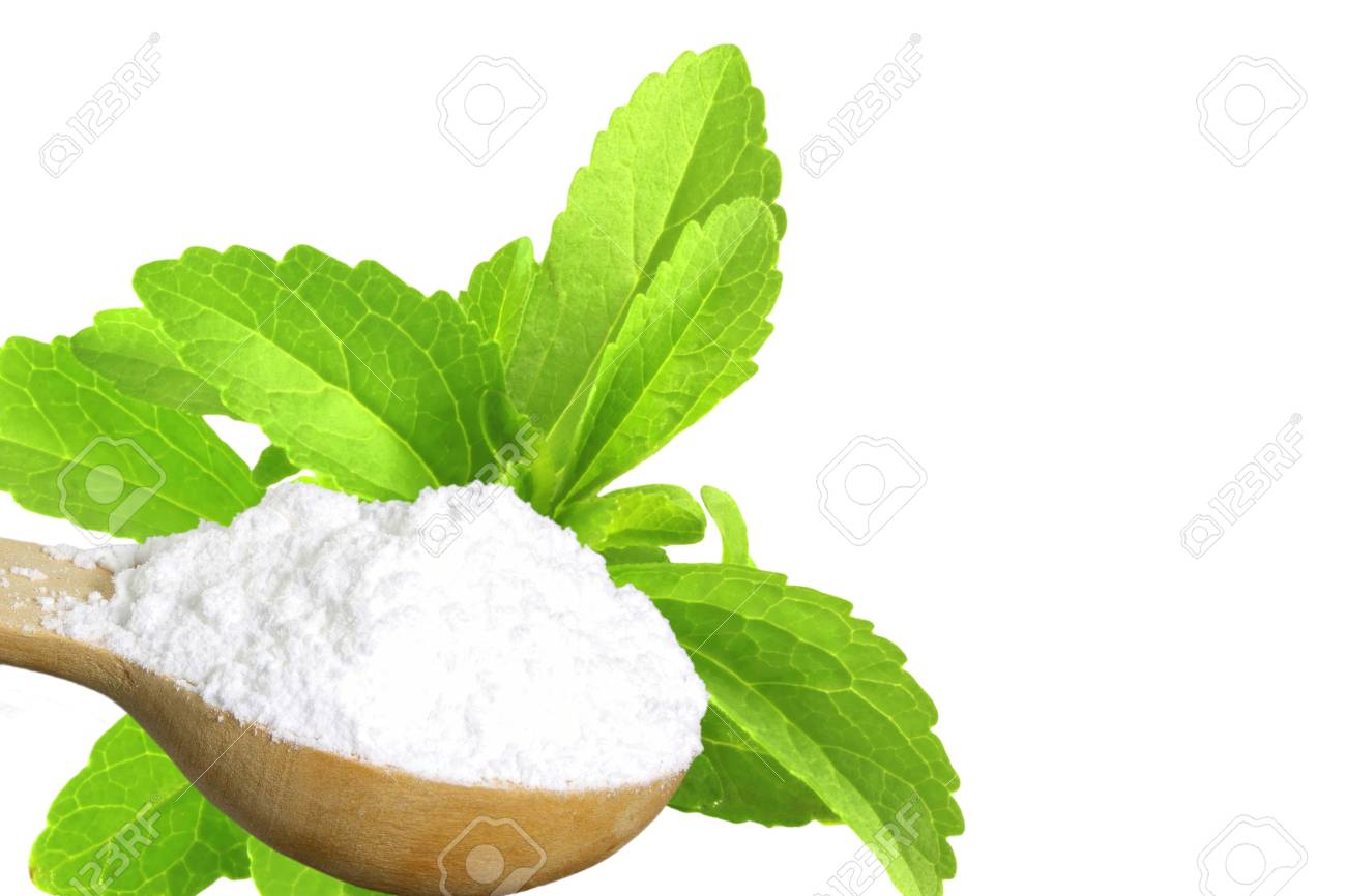 Sugar Substitute Stevia Plant And Extract Powder On White