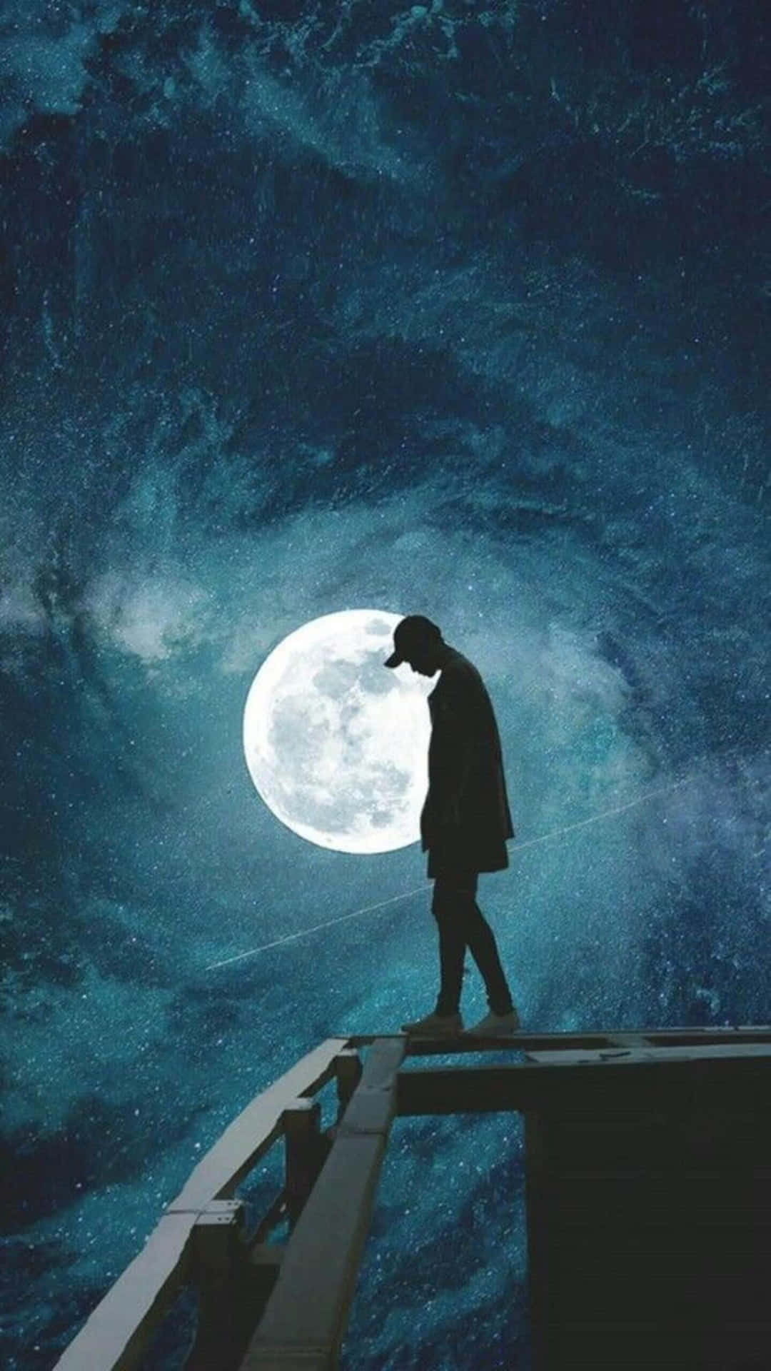 A lone figure silhouetted against a backdrop of a large, bright moon and a starry night sky, evokes a sense of sadness and contemplation