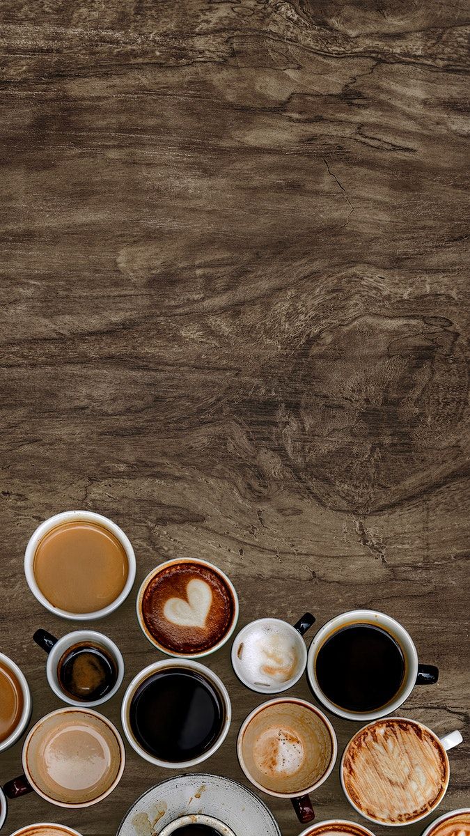 Assorted Coffee Cups On Natural Wooden Background Wallpaper