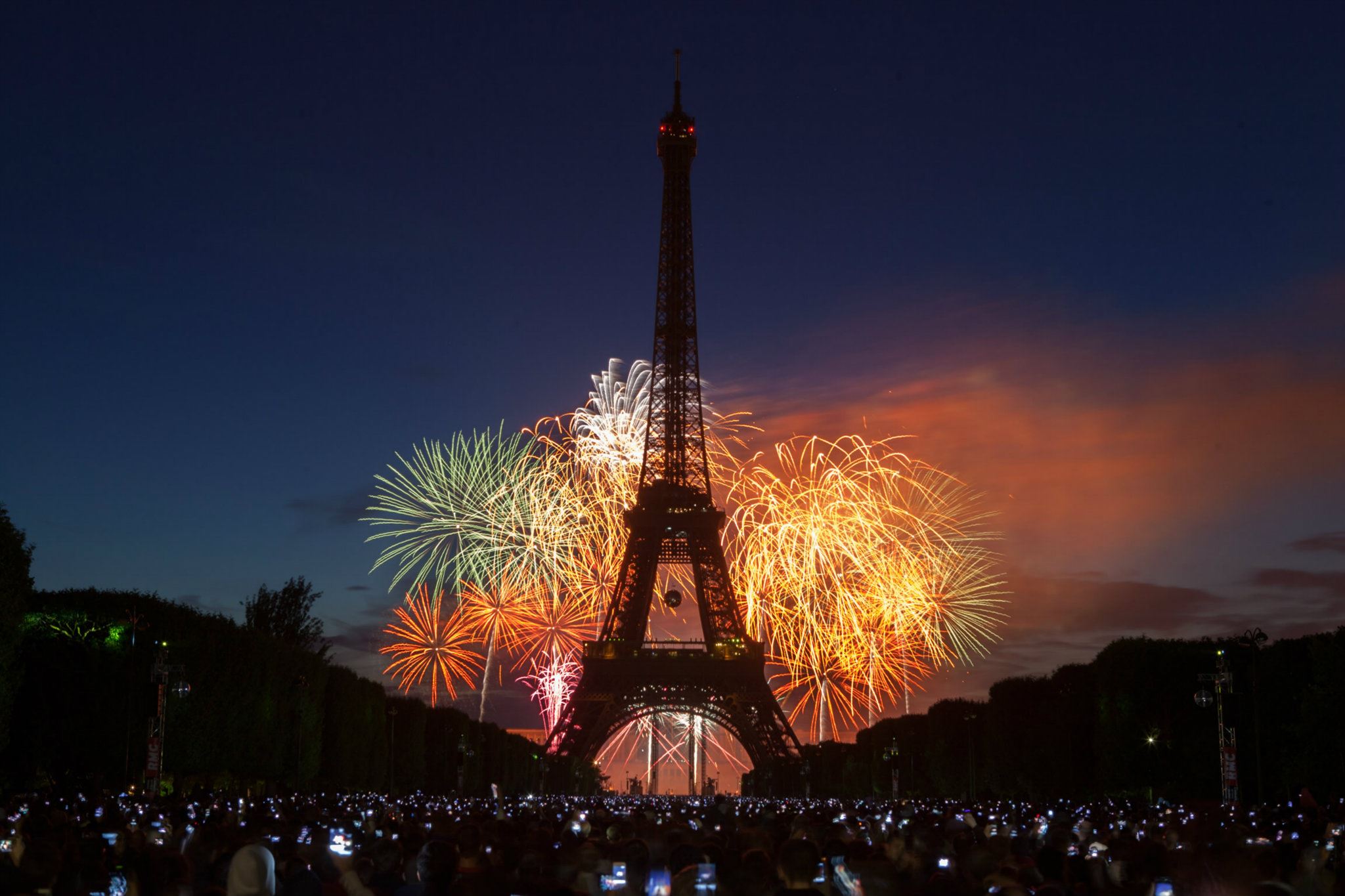 Pople Of Paris Near Eiffel Tower Watching Fireworks On Bastille Day