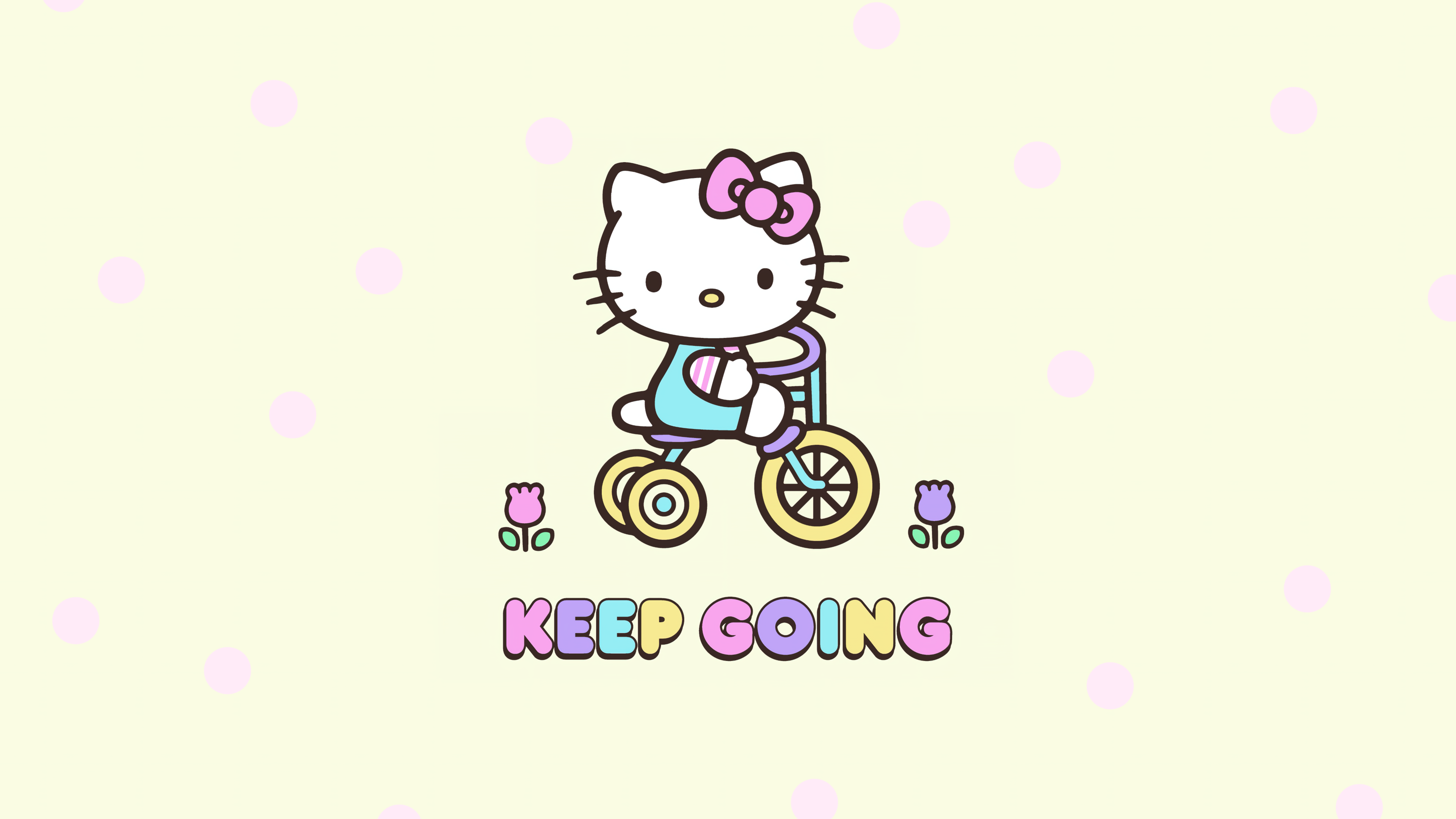 Hello Kitty riding a tricycle with the encouraging message 'Keep Going'