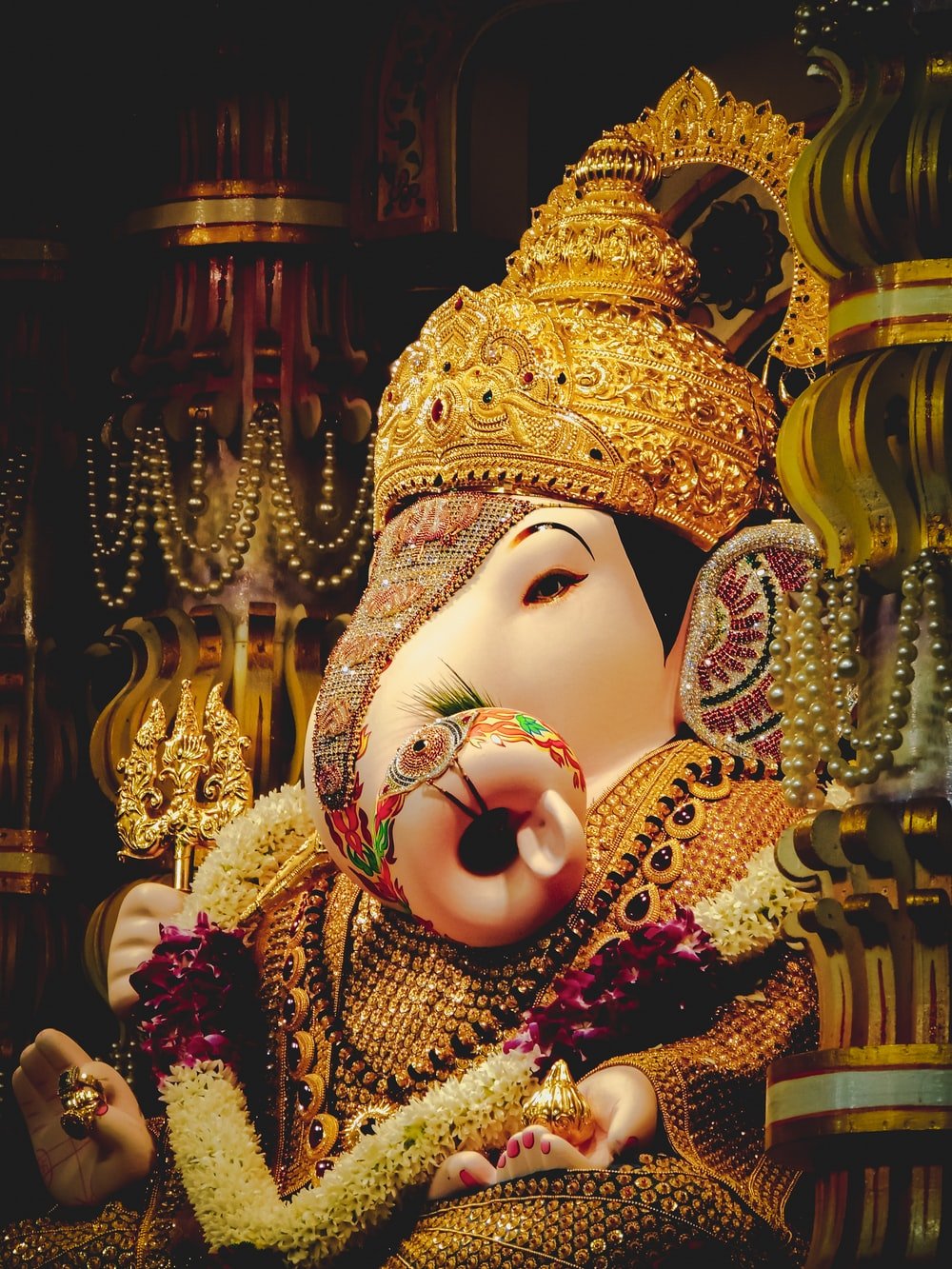 Lord Ganesha figurine photo Free Pune Image on