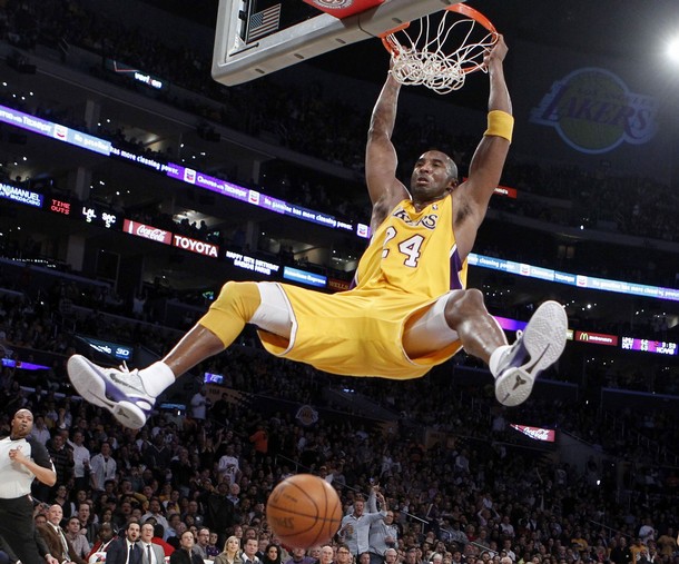 Lakers Bryant Slam Dunks Against The Kings During Their Nba