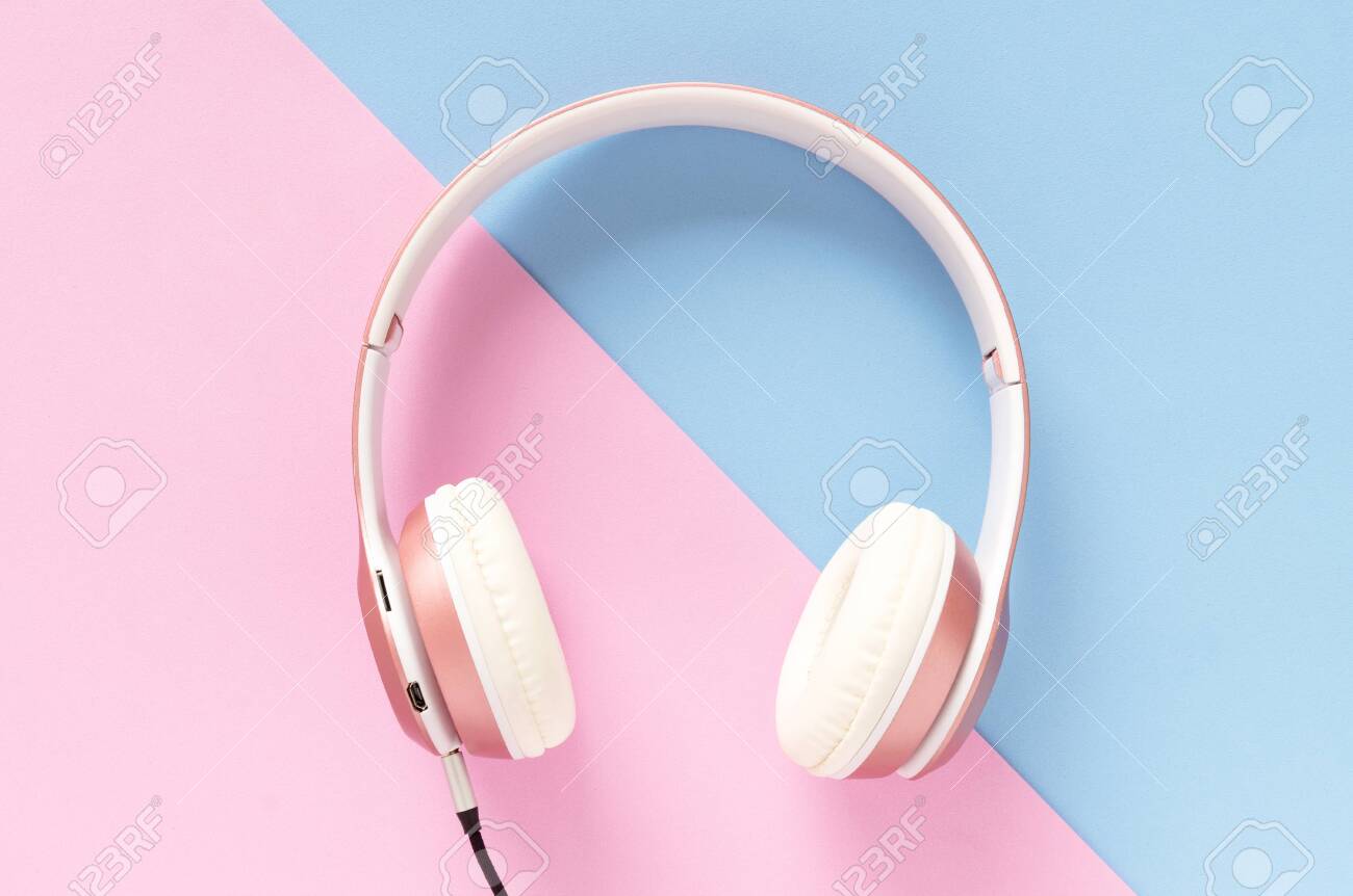Pink Headphone And Black Cable On Pastel Color Blue