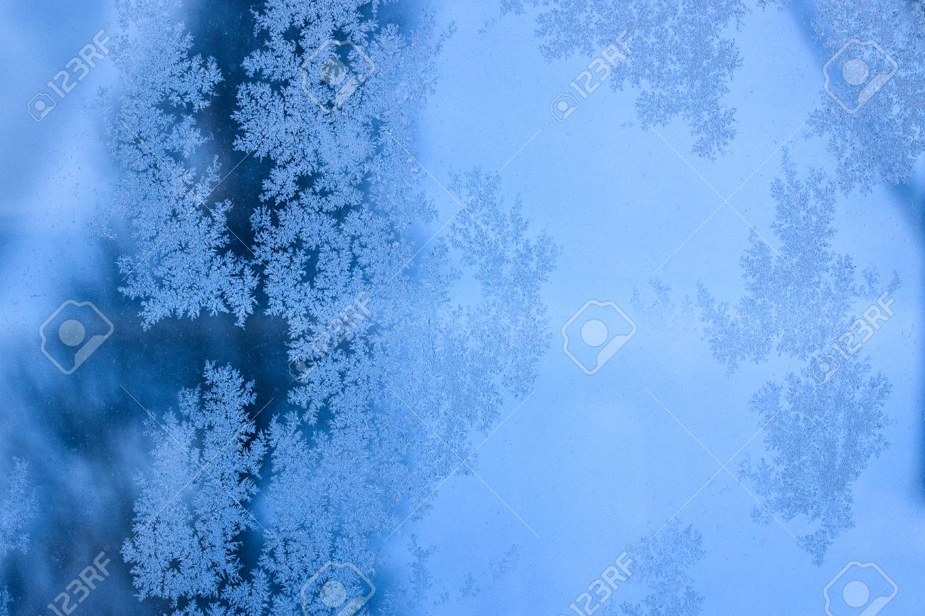 Winter Evening Patterns On A Glass Window Close Up Blue Bewitching