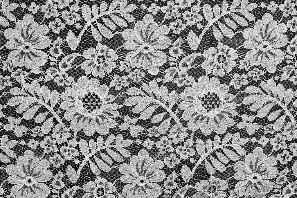 white lace pattern backgroundWhite fine lace floral texture on black