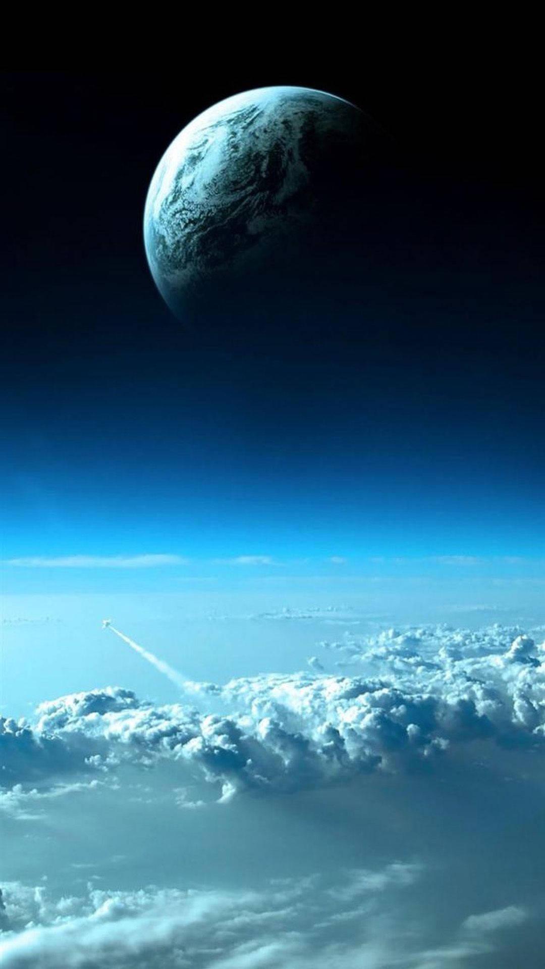 Pla And Clouds In Space iPhone Wallpaper