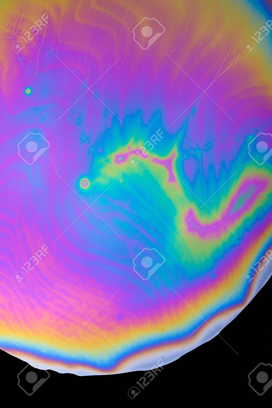 Abstract Rainbow Multicolored Iridescent Oil Spill On Black