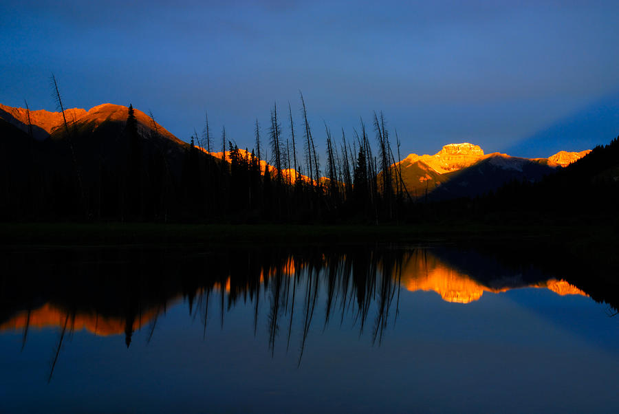 Golden Sunrise With Blue Background On Vermillion Lake