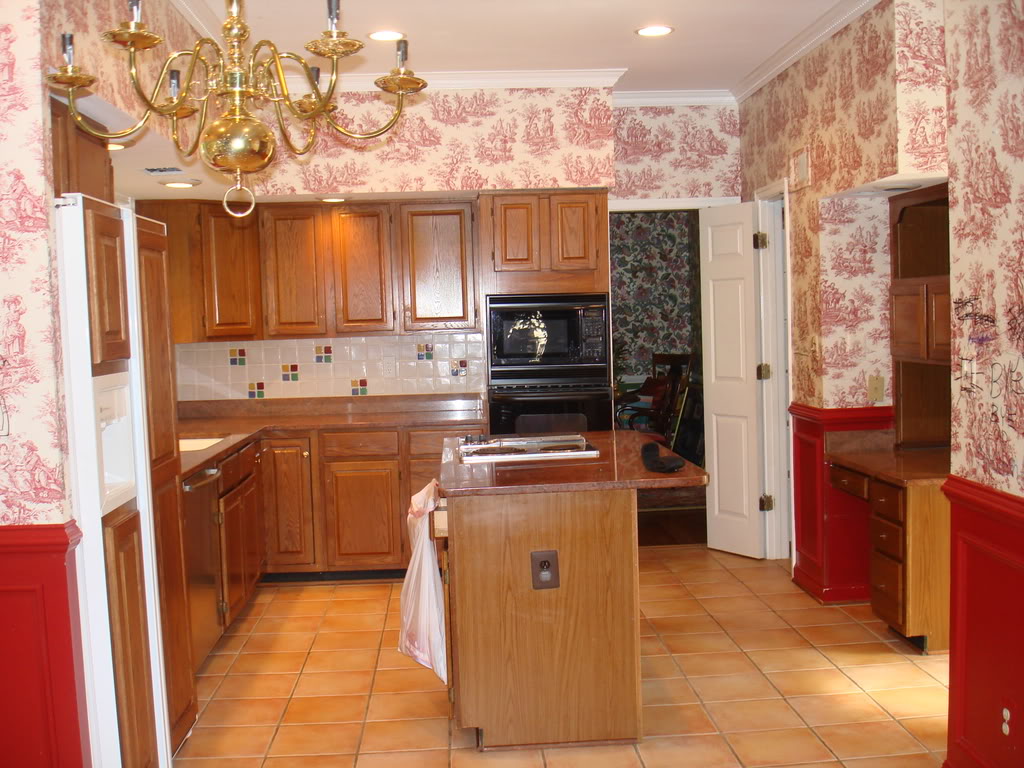 The Paint Color Below Wallpaper Was A More Muted Red Than It Appears