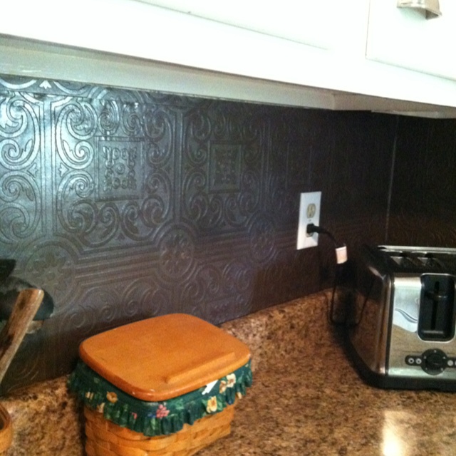 Tin Wallpaper Painted With Rubbed Bronze Spray Paint For Backsplash