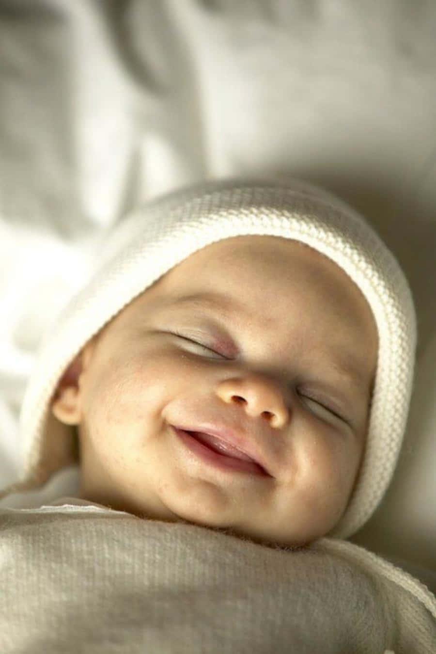 Cute Sleeping Baby Smile Picture Wallpaper