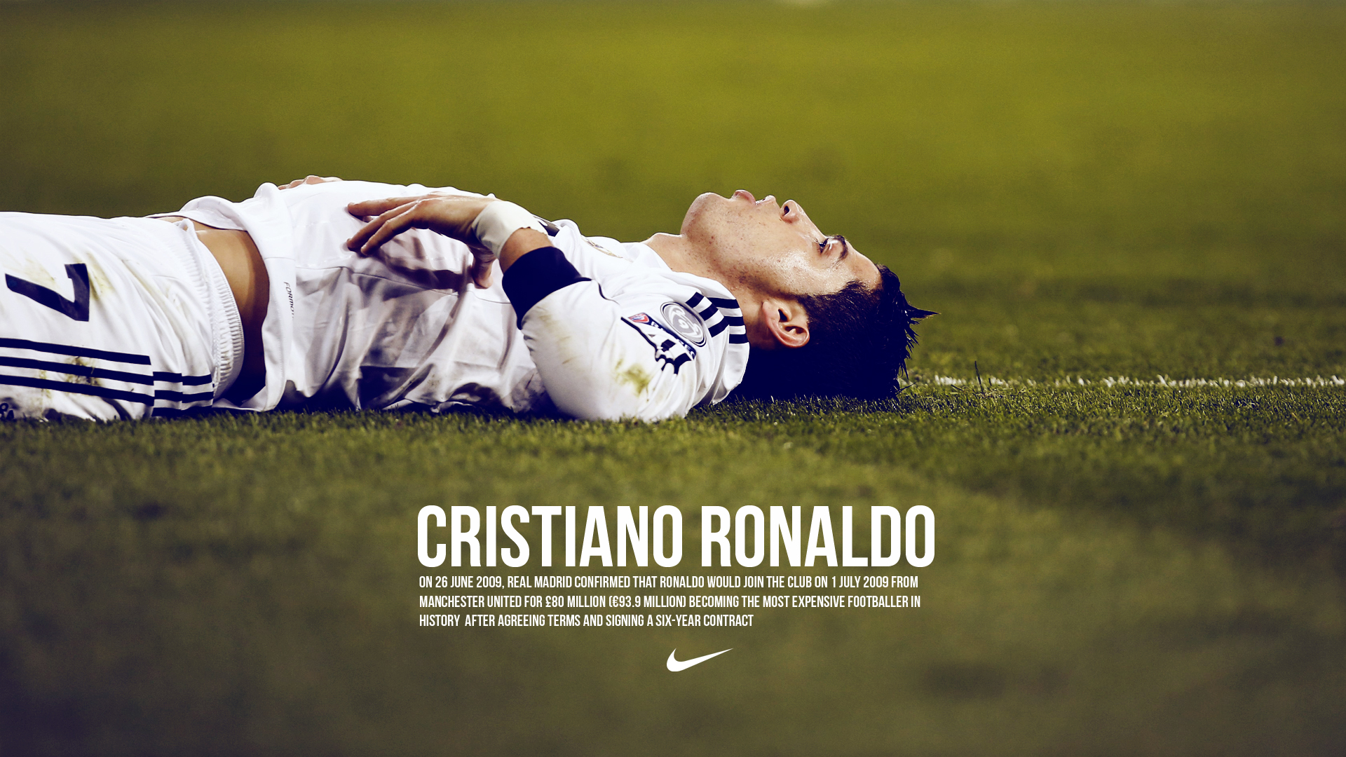 Cristiano Ronaldo lying on the soccer field after joining Real Madrid