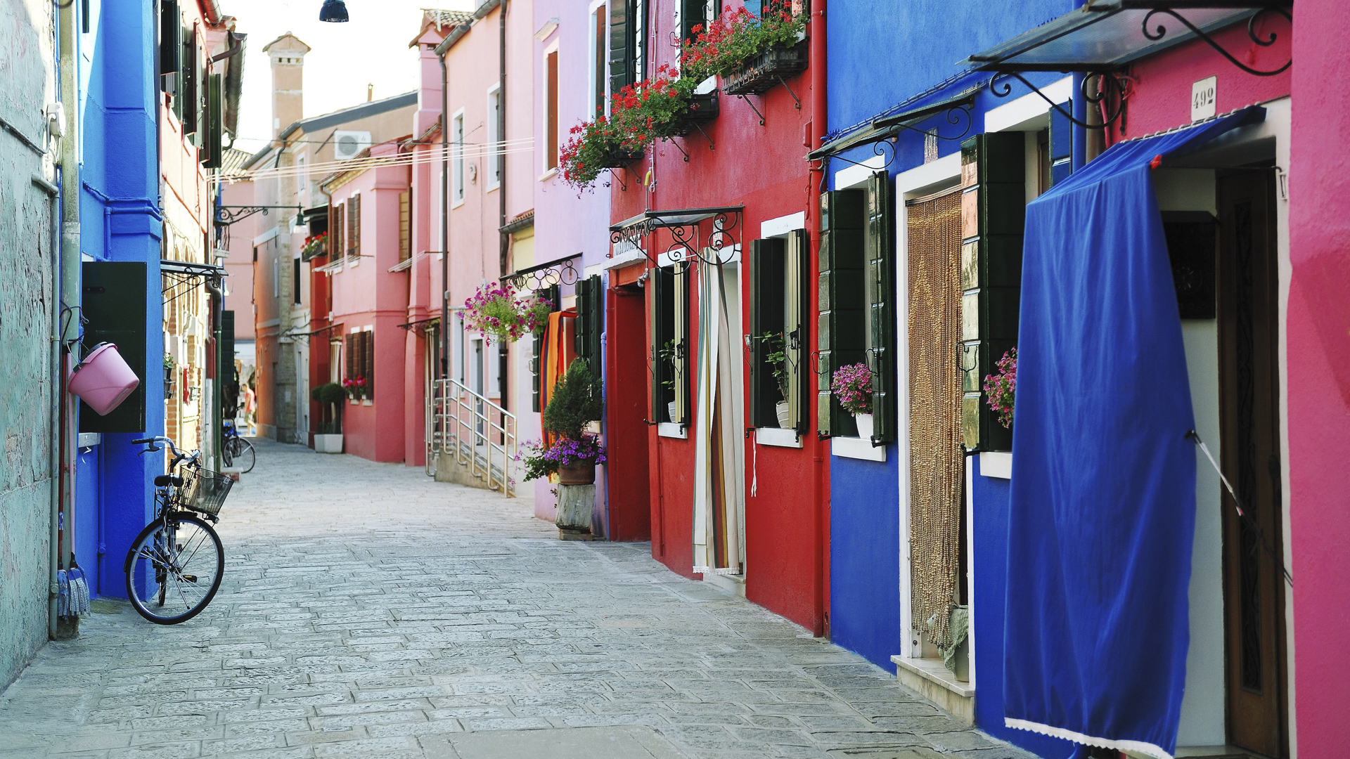 Colorful Buildings In Burano Island Street Venice Italy