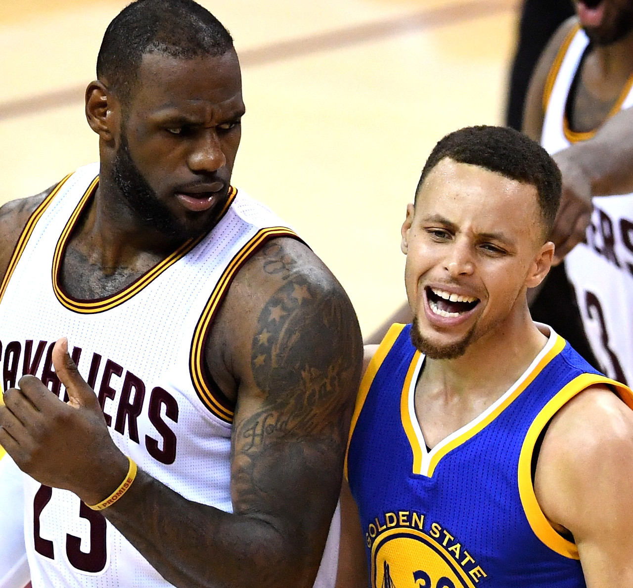 LeBron James and Stephen Curry face off during an intense NBA game