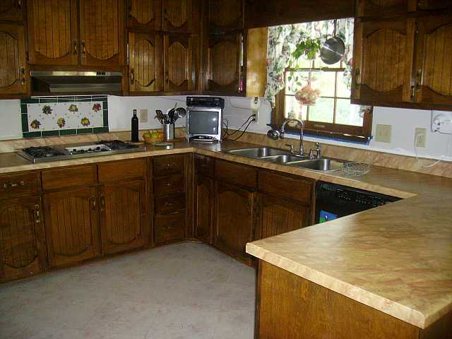 Counter Tops Covered With Travertine Carmel Paper Illusion
