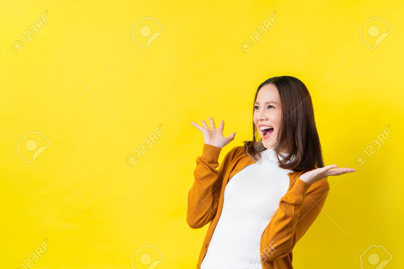 Asian Girl Is Surprised She Excited Yellow Background Studio