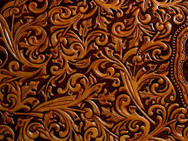 Red Tooled Leather Background Hand