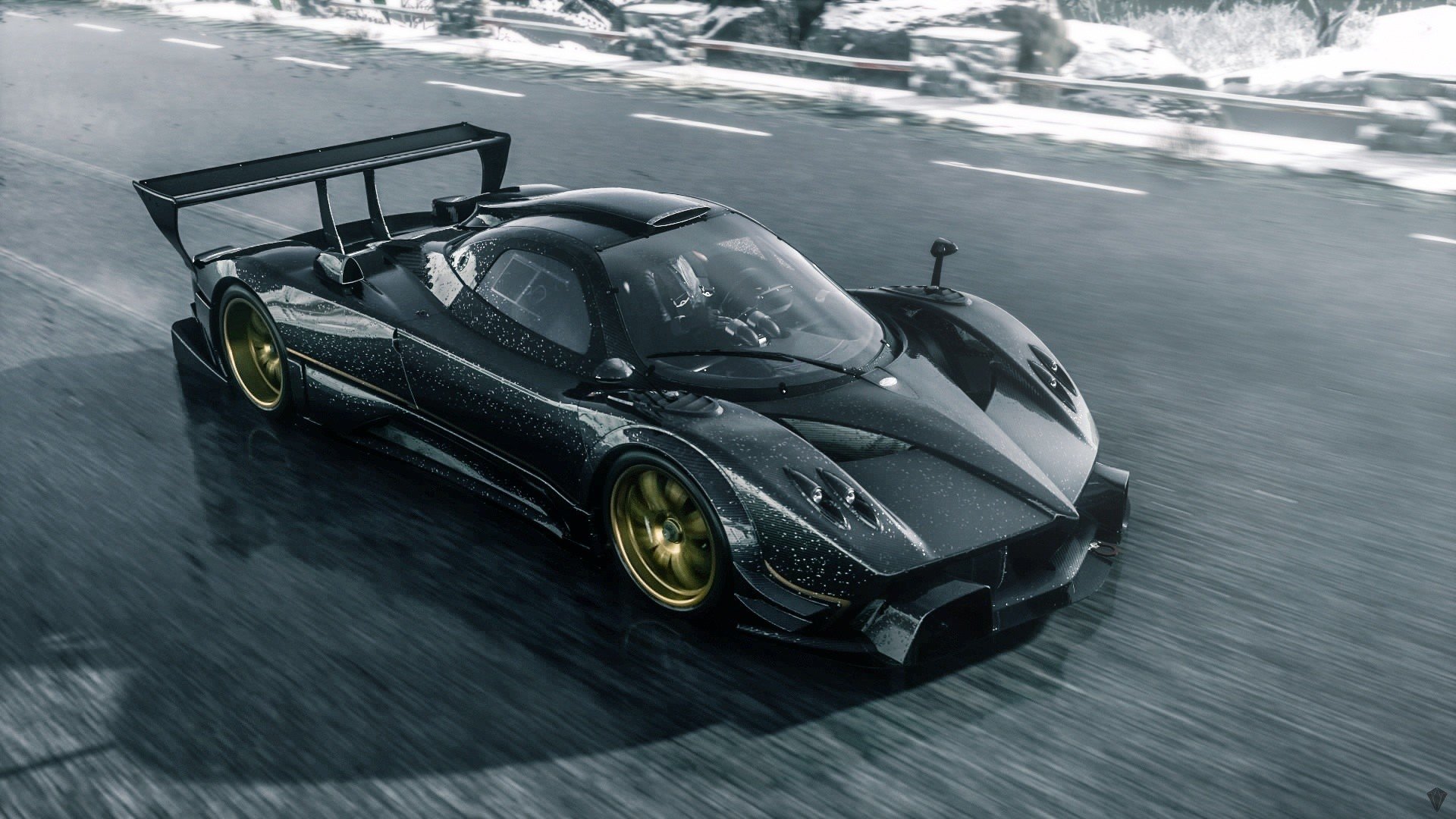 A sleek black Pagani Huayra BC races down a rain-slicked road, snow dusting the roadside
