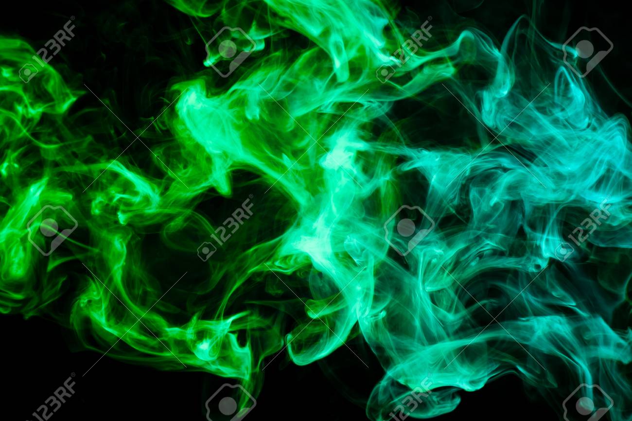 Colorful Green Smoke On A Black Isolated Background