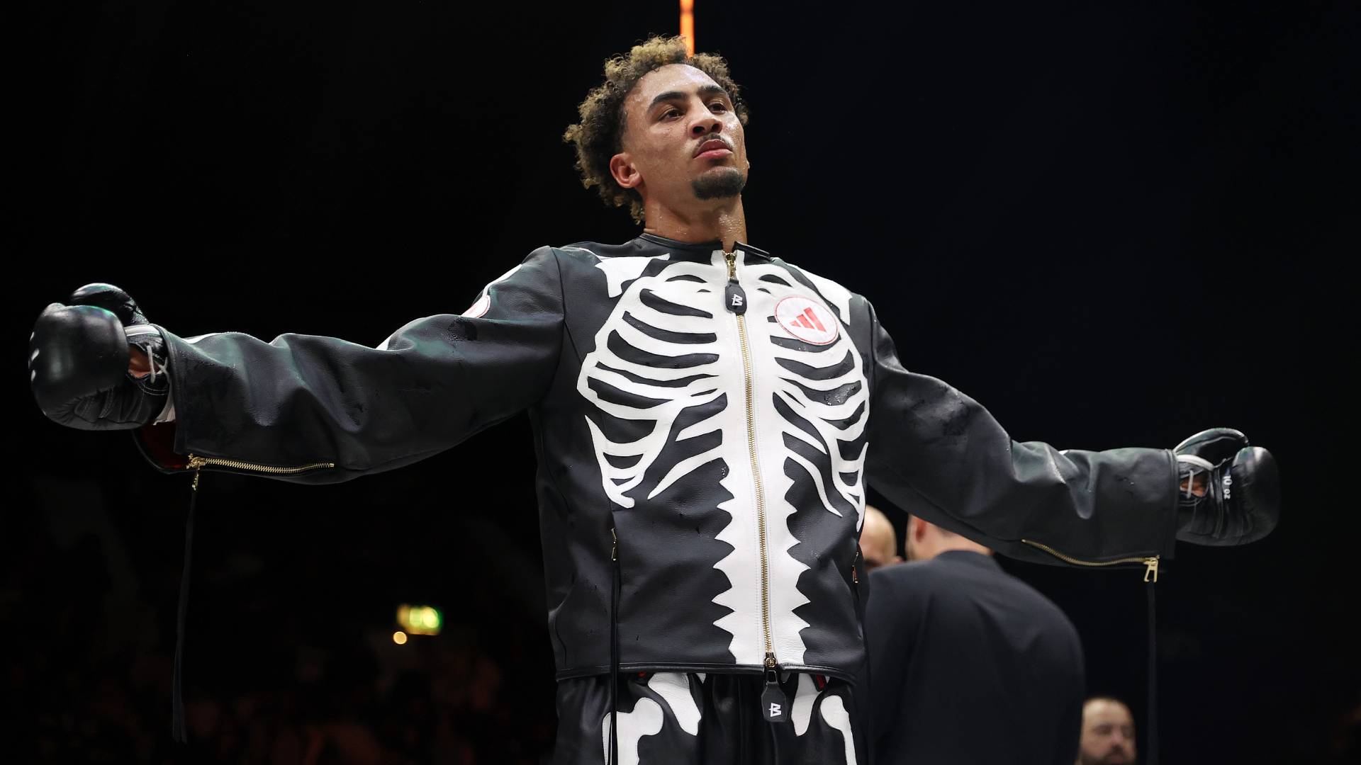 Benjamin Whittaker celebrating in a skeleton-themed outfit