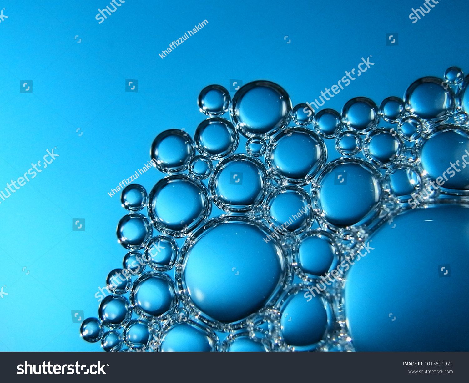 Macro Bubble With Backlight And Blue Background Ad Spon