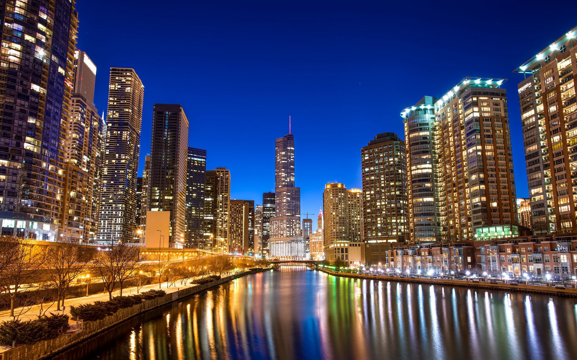 Stunning night view of the Chicago skyline reflected in the Chicago River