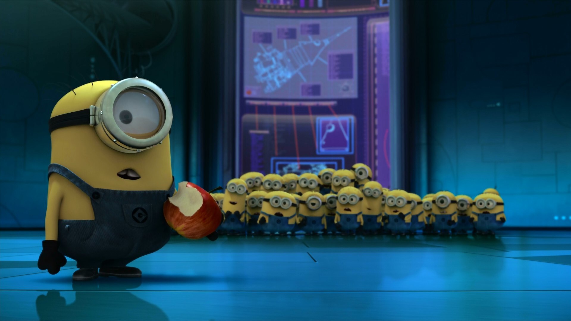 A minion from Despicable Me holding an apple and looking at a group of minions