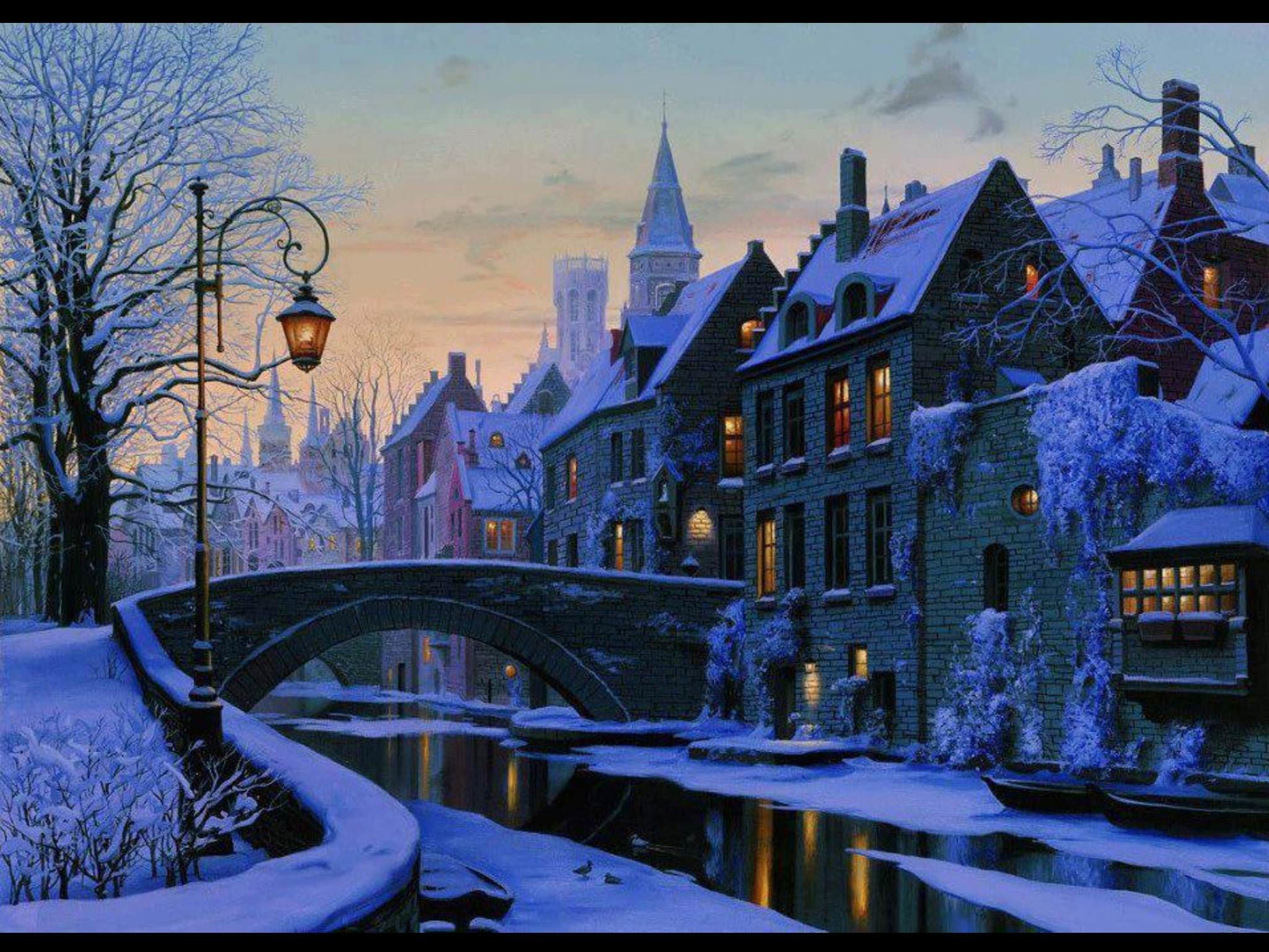 A cozy winter cityscape at dusk, featuring snow-covered buildings, a bridge over a canal, and warm lights emanating from the windows