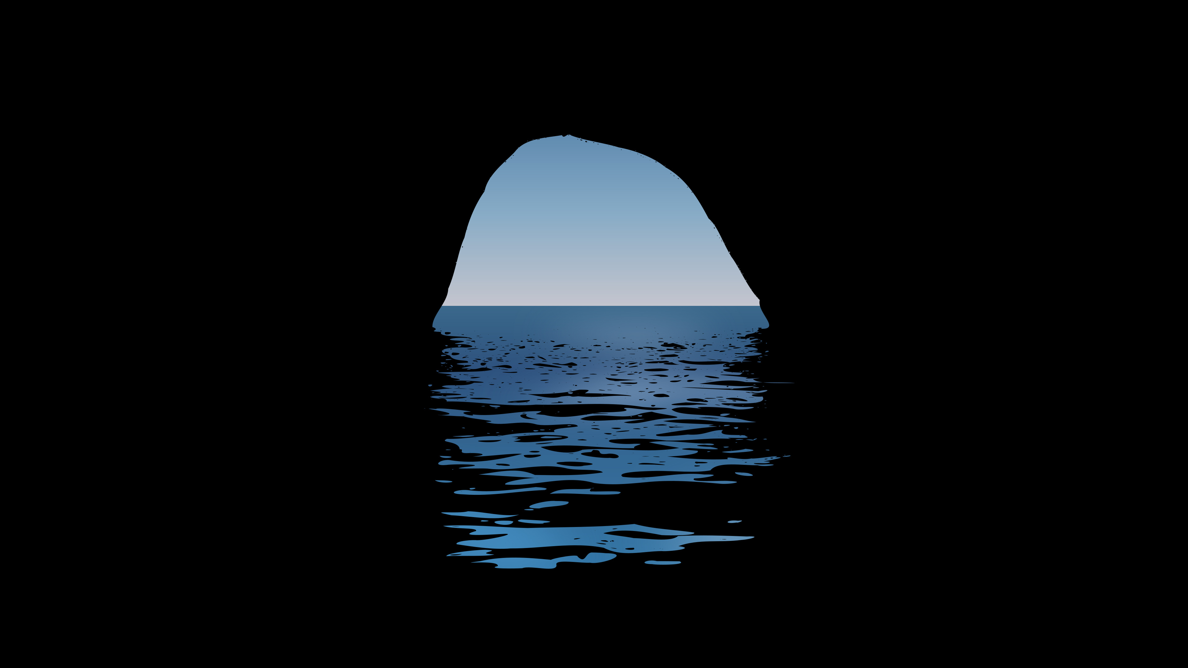 A serene view of the ocean through a dark cave entrance, evoking a sense of mystery and tranquility