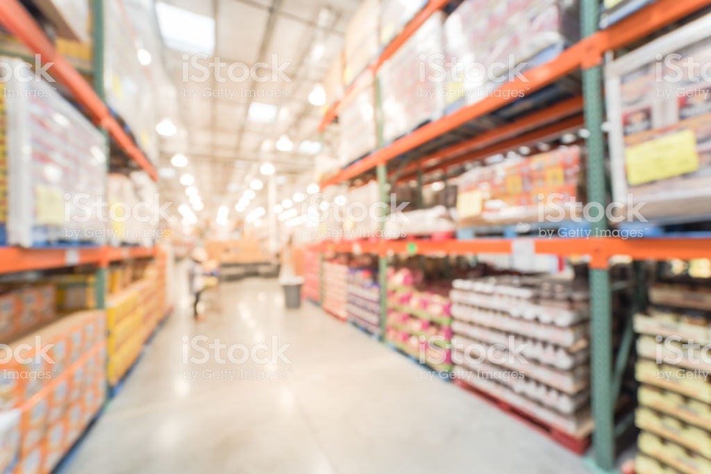 Blurry Background Customer Shopping At Bigbox Wholesale Store In