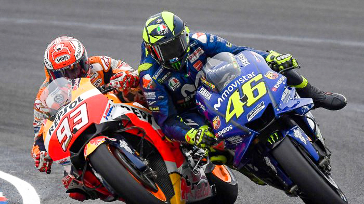 The Clash Between Valentino Rossi And Marc Marquez Wallpaper