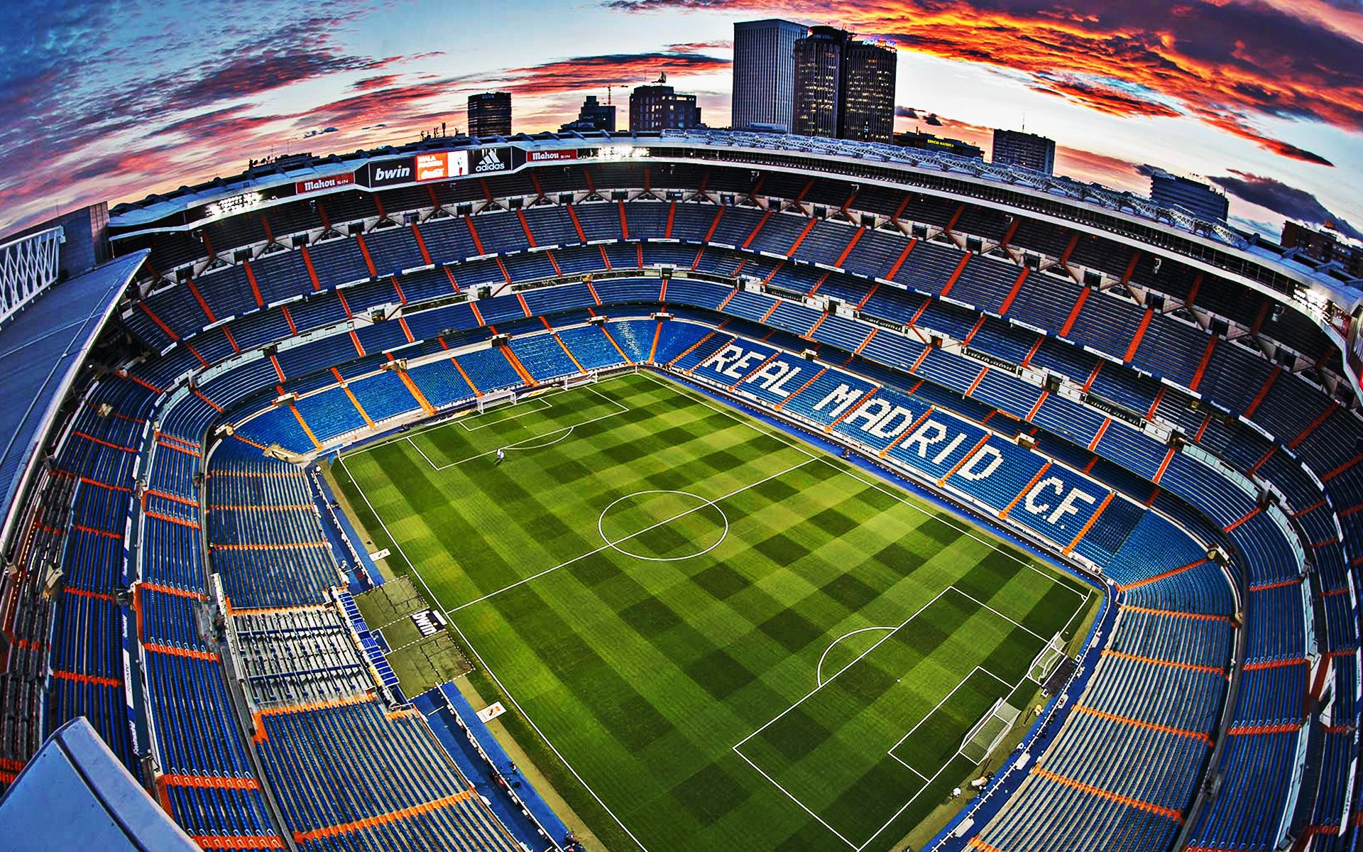 A stunning 4K aerial view of the Santiago Bernabéu Stadium, home of Real Madrid, at sunset