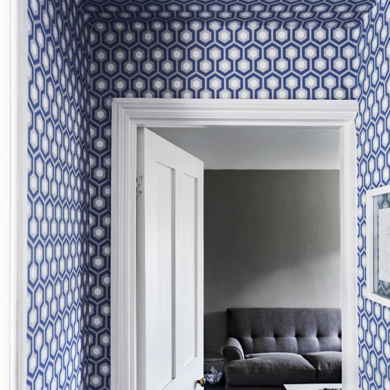 Graphic Hallway With Geometric Wallpaper Designs