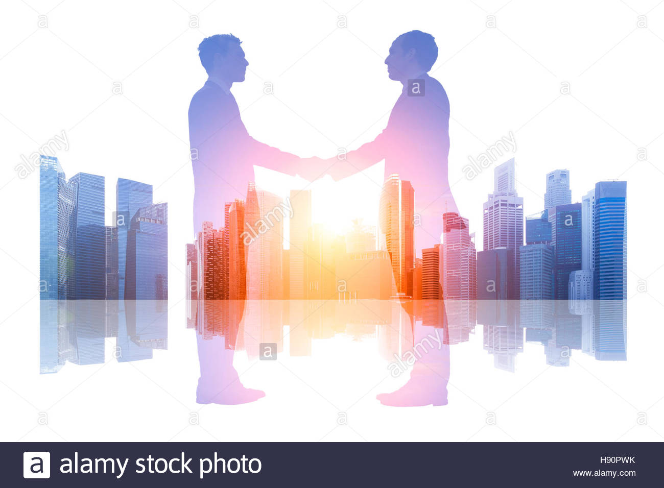 Double Exposure Of Business People Shaking Hands Over A Cityscape