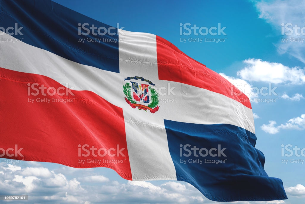Free download Dominican Republic Flag Waving Cloudy Sky Background