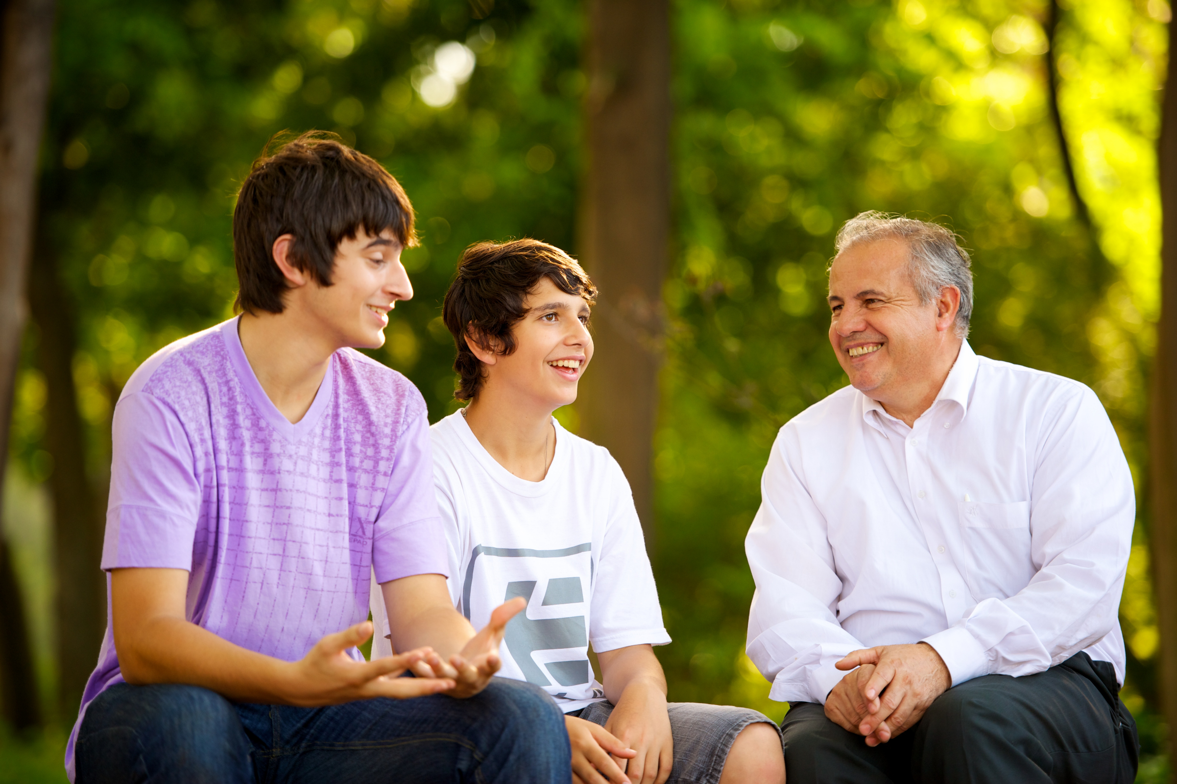 Young Men Laughing With A Man