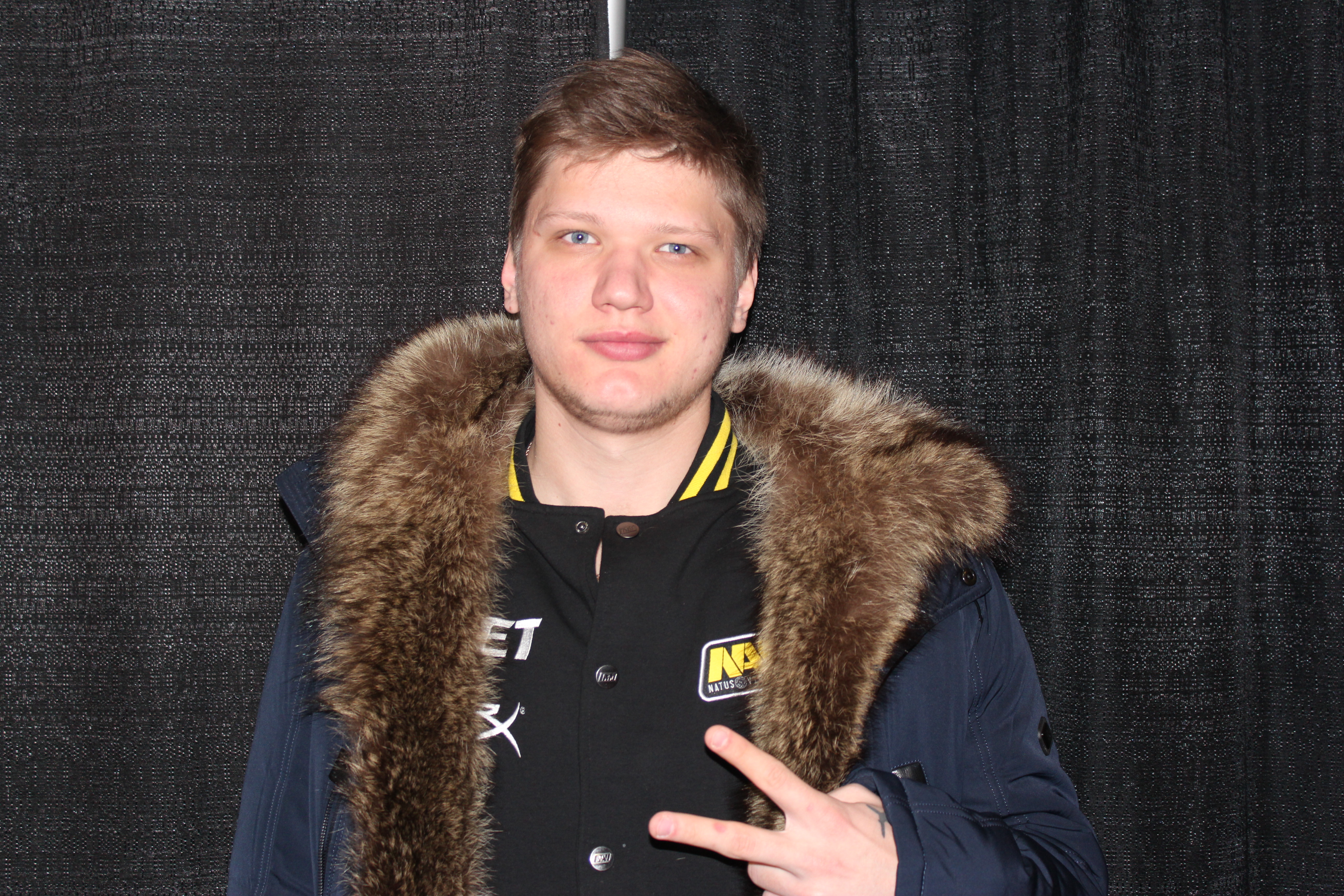 s1mple, professional Counter-Strike player for Natus Vincere, posing for a photo