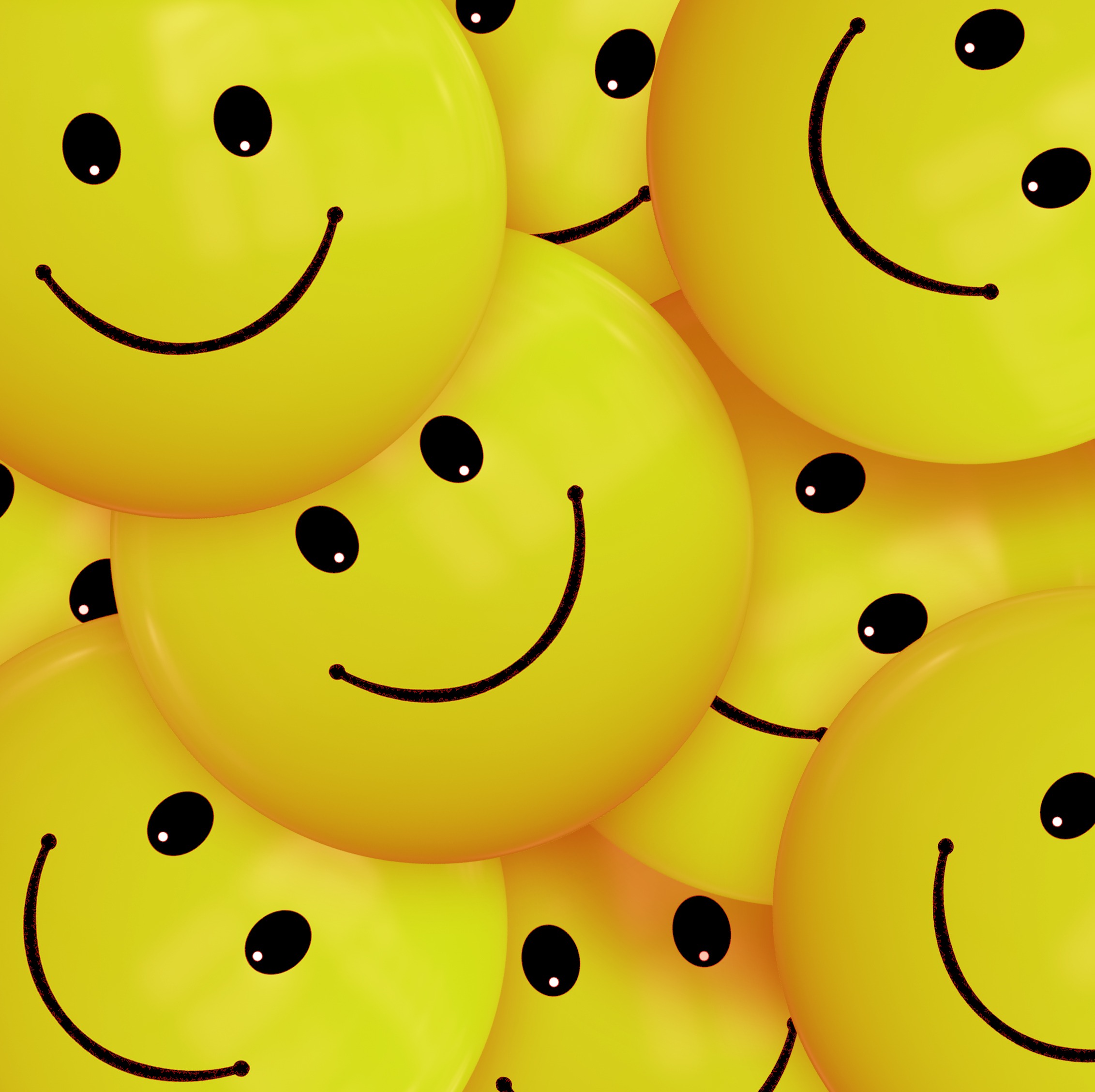 A cheerful close-up of numerous 3D smiley faces, radiating positivity and happiness