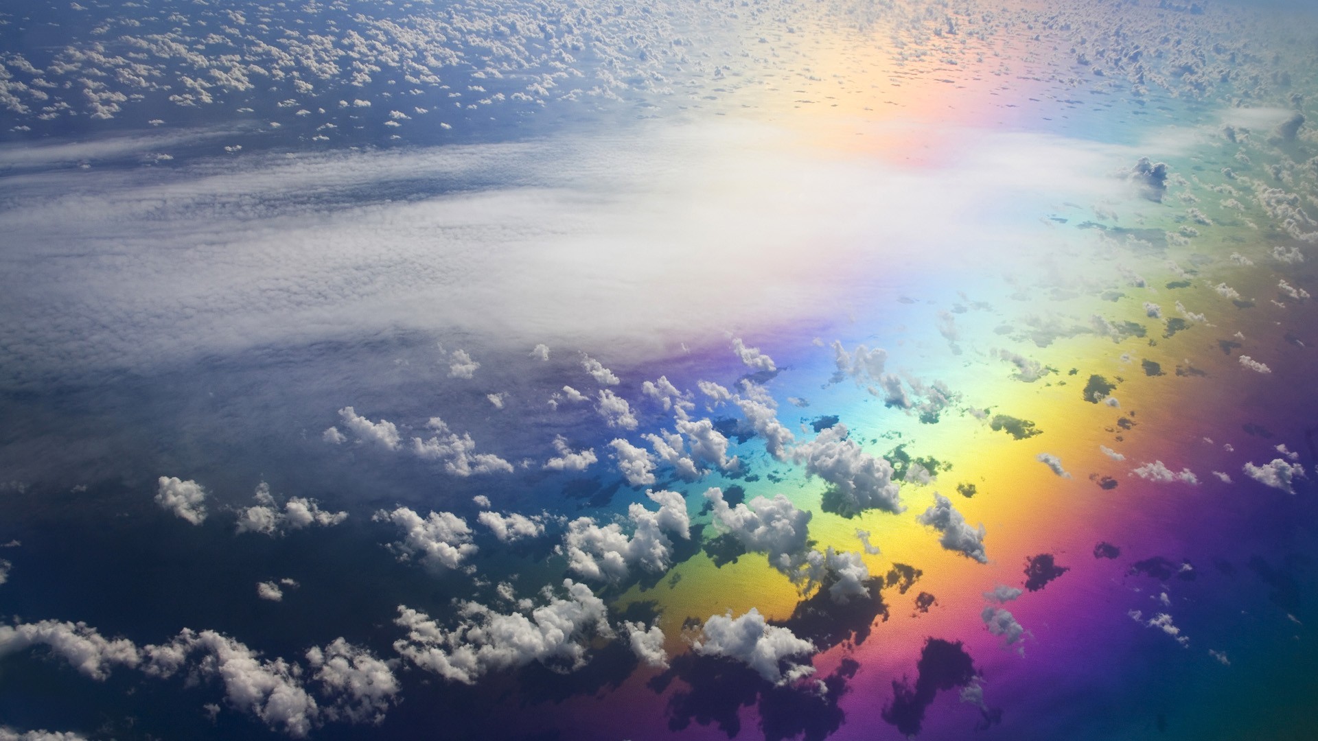 Rainbow between the clouds wallpaper 3429