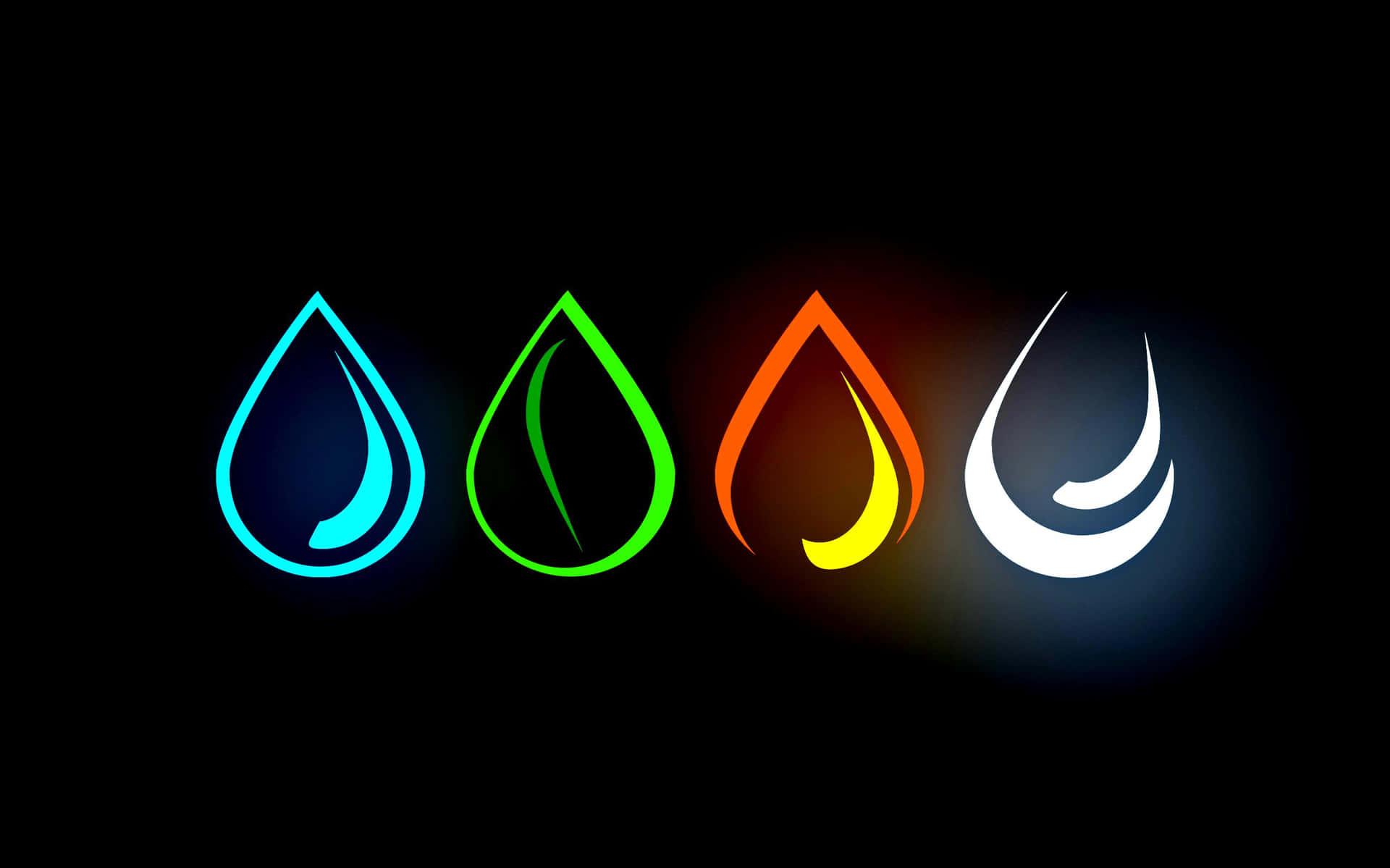 Four Different Colored Water Drops On A Black Background