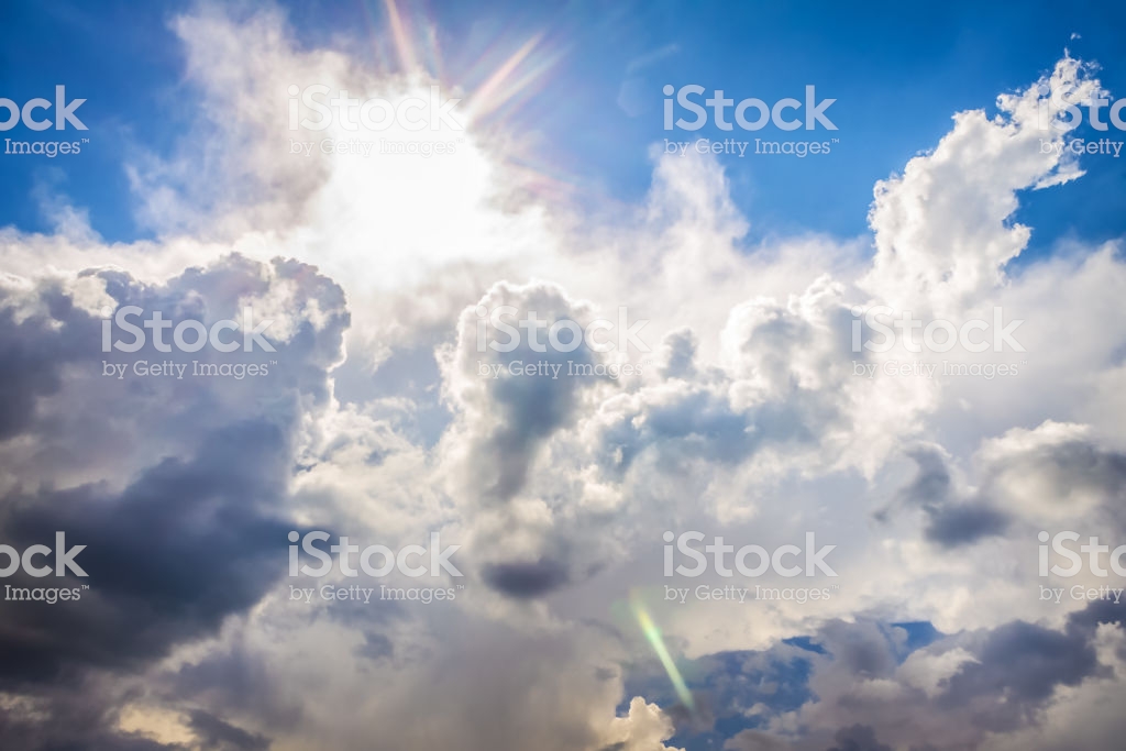 Bright Blue Sky Sun And Fluffy Beautiful Clouds Nature Background