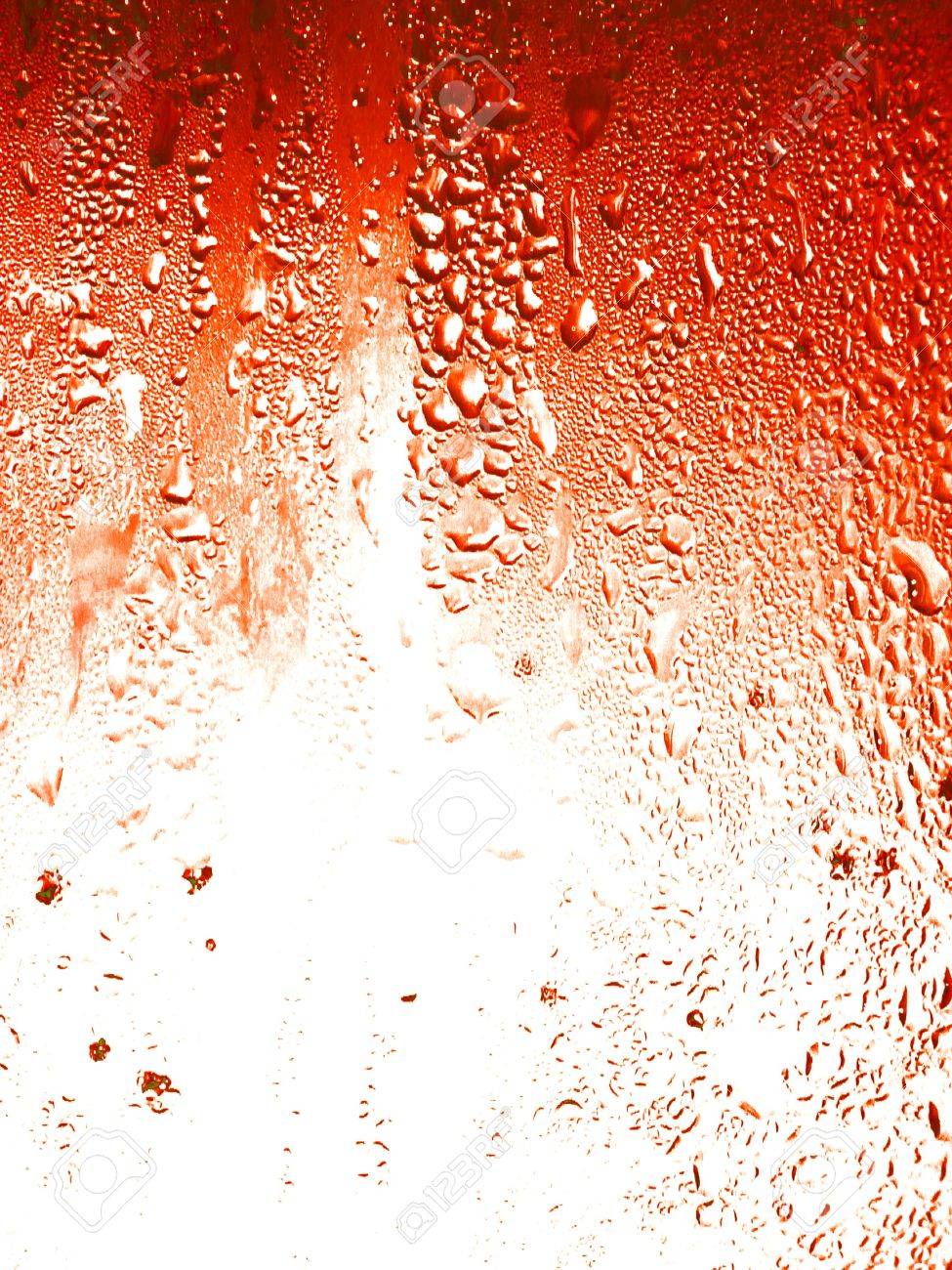 Redish Orange Soda Background Full Of Liquid Drops Stock Photo