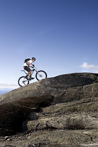 Climbing The Mountain On A Bike Wallpaper For iPhone 3g 3gs