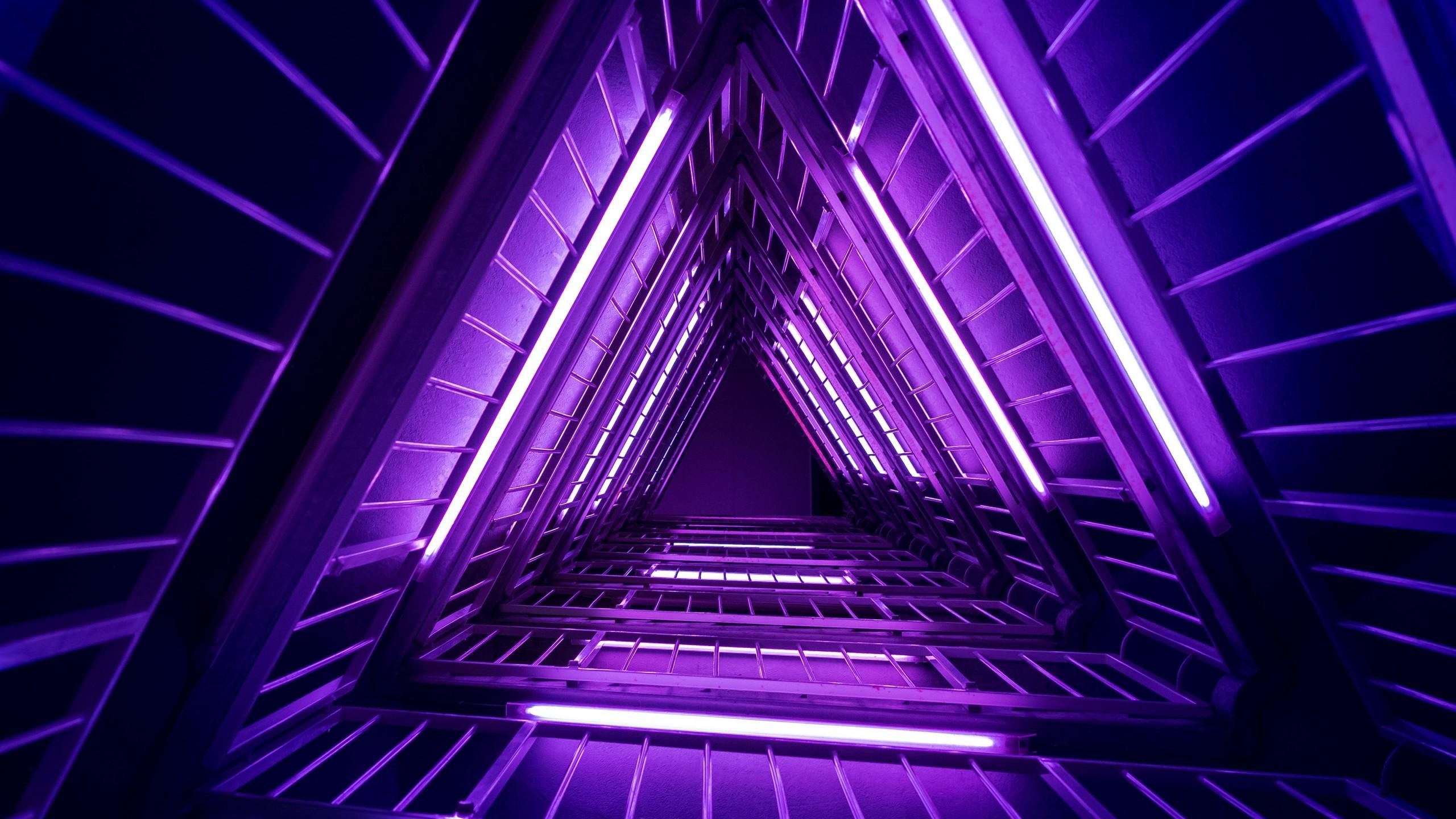 A mesmerizing neon tunnel glowing in vibrant purple, creating a futuristic and abstract space