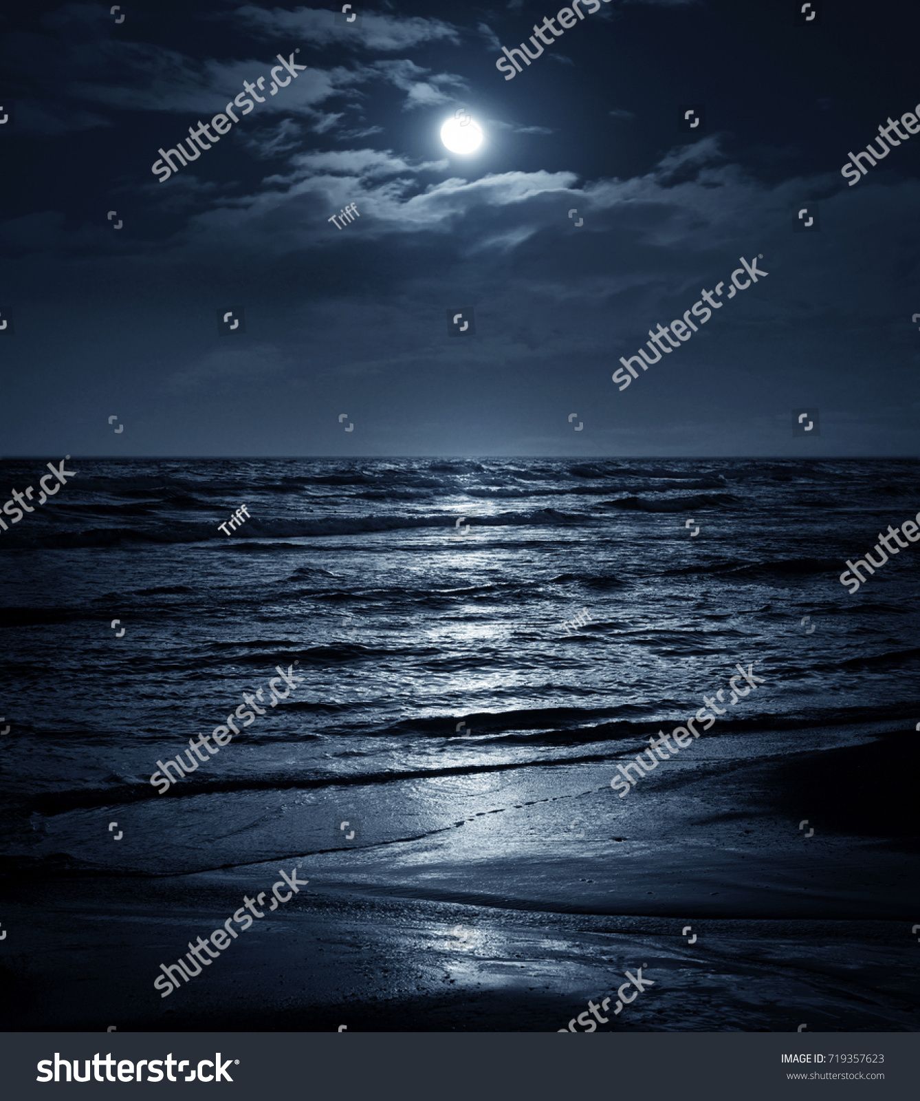Moon In Night Sky Over Moonlit Sea Water Travel Background